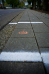 Streep eronder, aan de arbeid. Koepoortwal, Doesburg.
